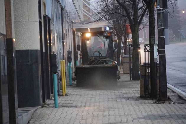 Sidewalk sweeping in Thunder Bay Waterfront District