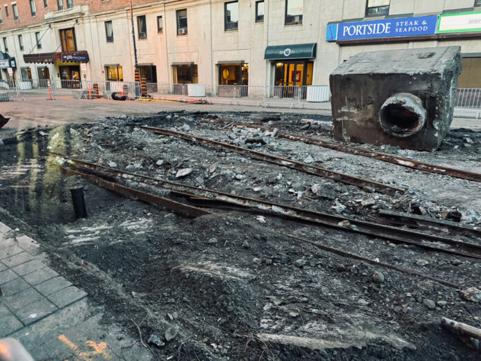 Construction continues in the Waterfront District. Cumberland Street North shows the old rail lines from the street car days of the past.