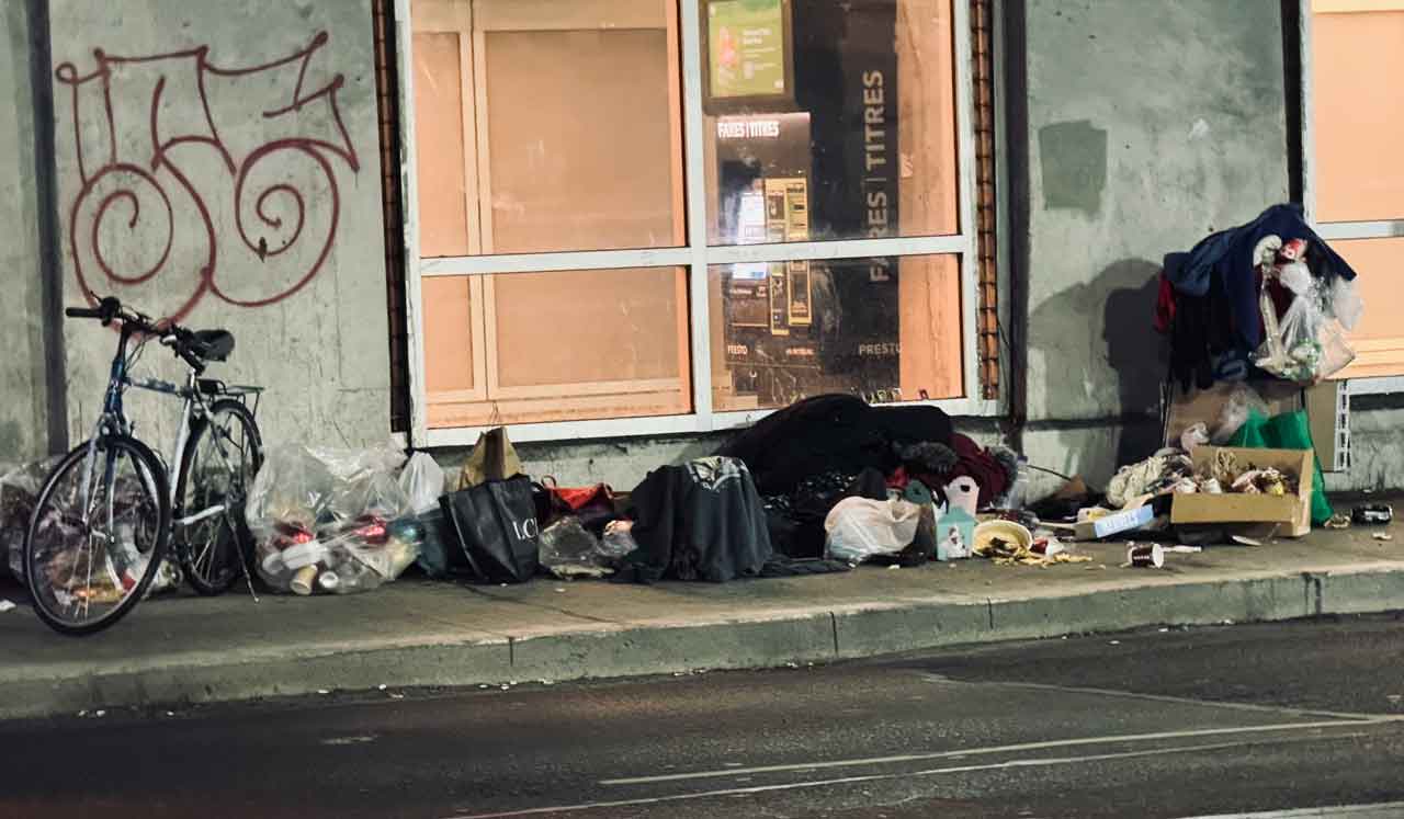 Toronto Faces a growing homelessness crisis, this image was captured of a person living under a bridge in downtown Toronto.