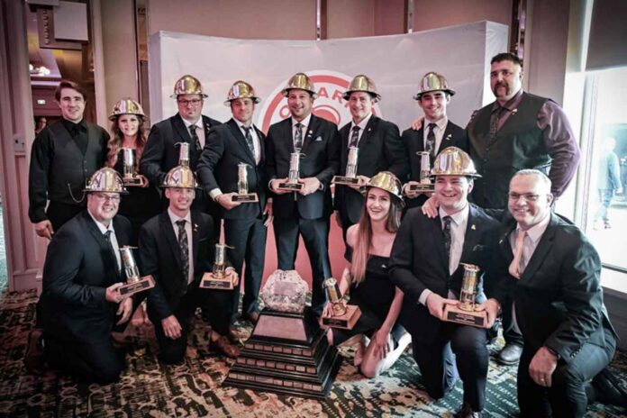 Agnico Eagle Macassa Mine Rescue Team of the Kirkland Lake District – back row, left to right: Mine Rescue Officer Nick Schwehr, Carlie Dewar, Coach Jonathan Boutin, Denis Dion, Nick Perrier, Hubert Gour, Colin Price, Mine Rescue Officer Shawn Shail; Front Row: Jason Dicaire, Jean-Francois Racine, April Belecque, Jackson Lafrance, Alamos Gold Technician Garry Bennett