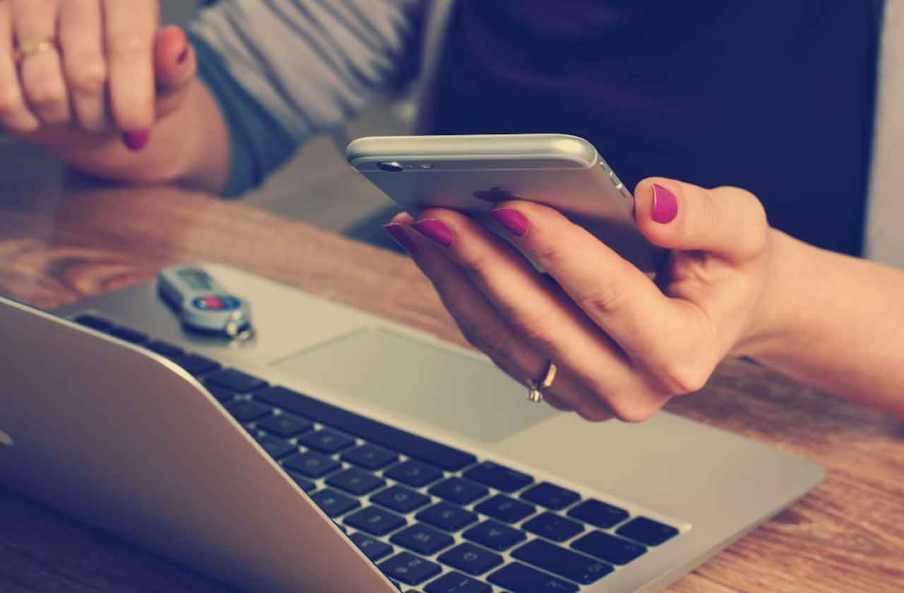 Woman Holding iPhone