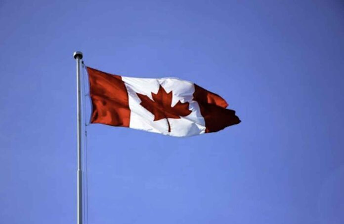 Canadian flag on a pole