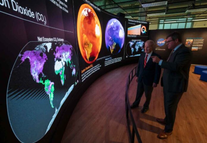 NASA Administrator Bill Nelson, left, and Kirk Johnson, Sant director, the Smithsonian’s National Museum of Natural History, preview NASA’s new Earth Information Center at the museum in Washington on Oct. 7, 2024. The exhibit includes a video wall displaying Earth science data visualizations and videos, an interpretive panel showing Earth’s connected systems, information on our changing world, and an overview of how NASA and the Smithsonian study our home planet. Credit: NASA/Bill Ingalls